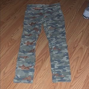Children place sparkly camo jeggings